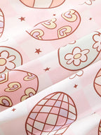 Pink kids pajama fabric with decorative egg, heart, flower, and star print, close-up view