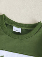 Green baby and toddler embroidered sweatshirt with ribbed crew neckline, neckline close-up
