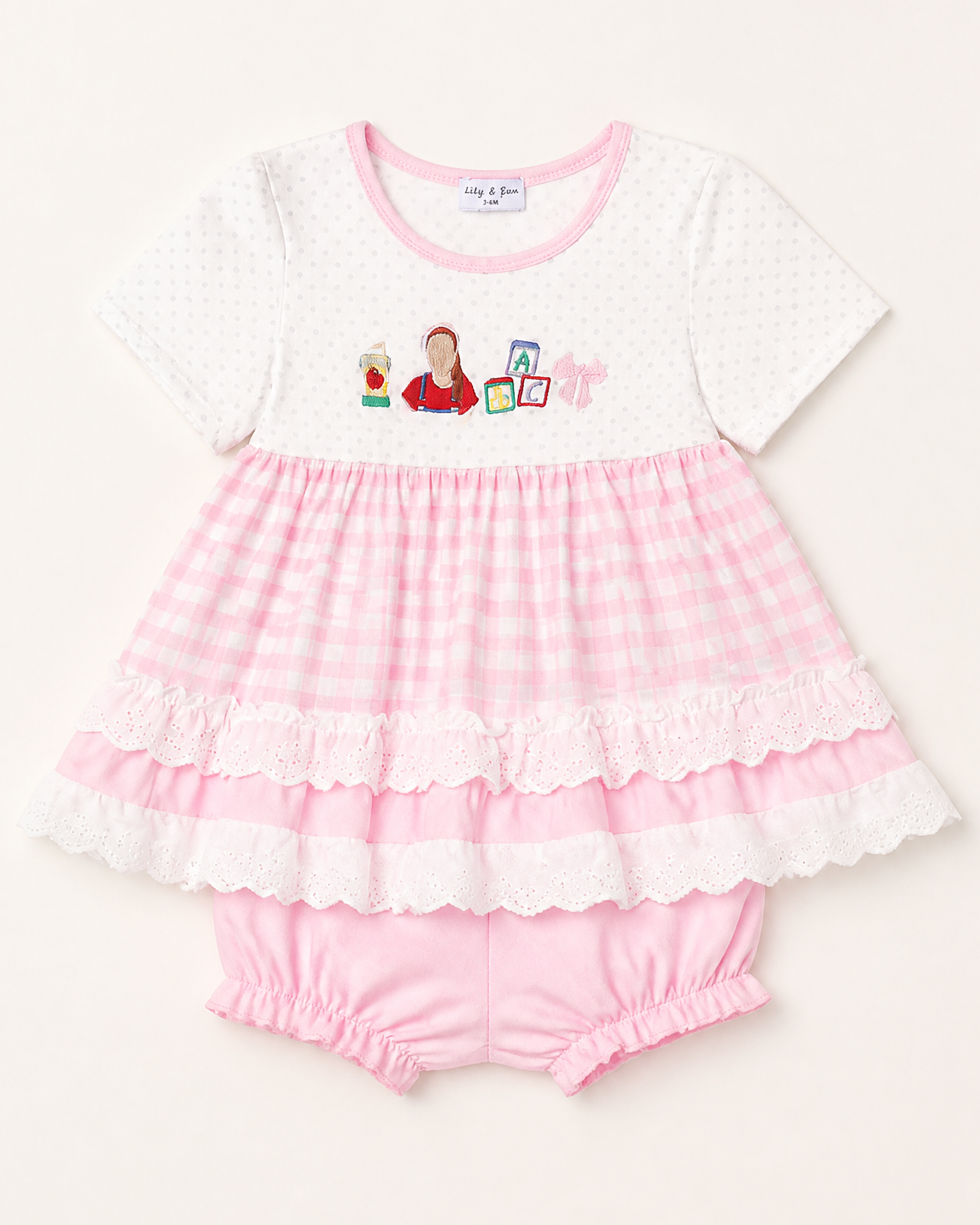 Pink gingham baby and toddler dress and bloomer set with ABC embroidery, front product view