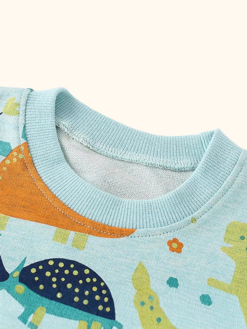 Turquoise kids dinosaur sweatshirt with ribbed crew neckline, close-up view
