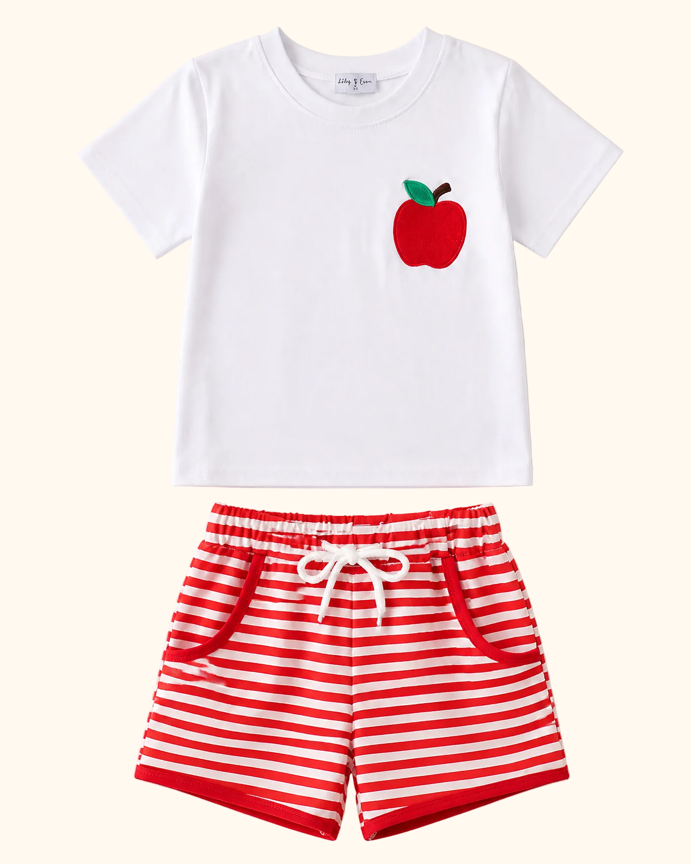 White kids T-shirt with red apple embroidery and red striped shorts, front product view
