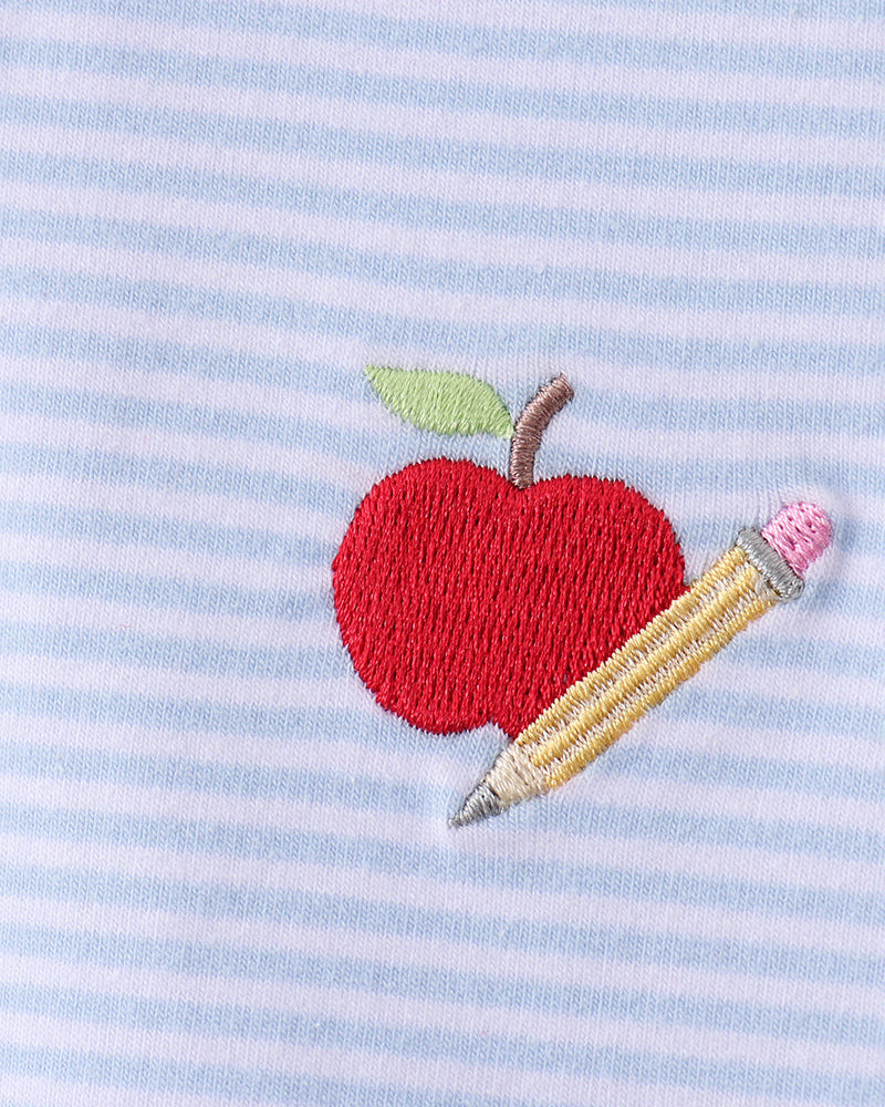 Blue striped kids polo with red apple and yellow pencil embroidery, chest detail view