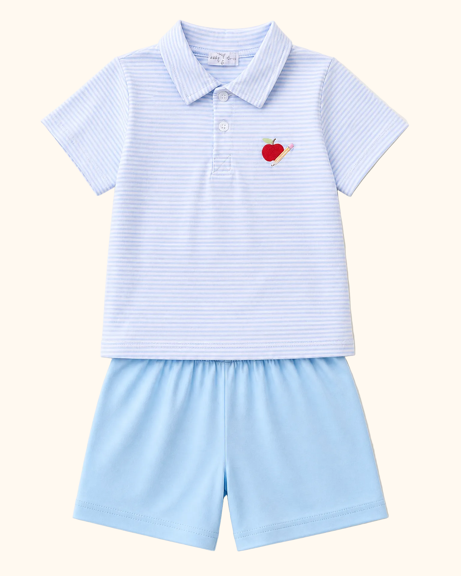 Blue striped kids polo with apple and pencil embroidery and solid blue shorts, front product view