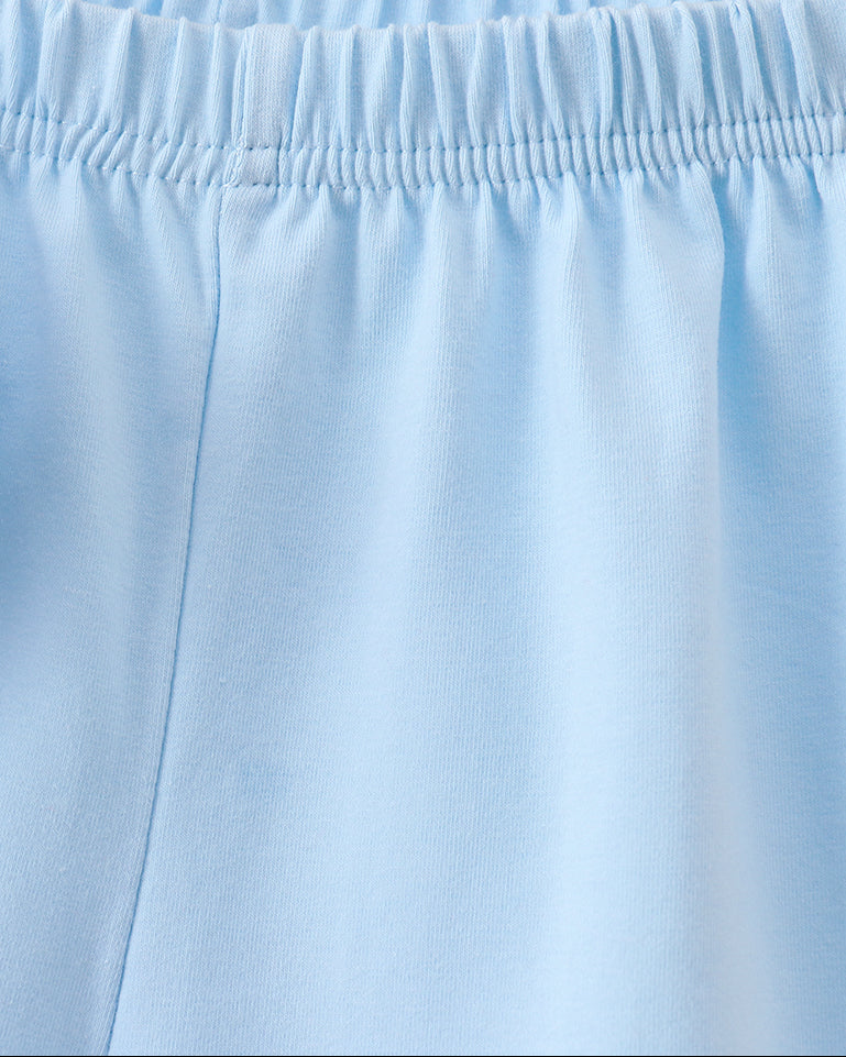 Solid blue kids shorts with elastic pull-on waistband, close-up view