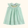 Aqua kids smocked bishop dress with embroidered yellow daisies and ruffle sleeves, front product view