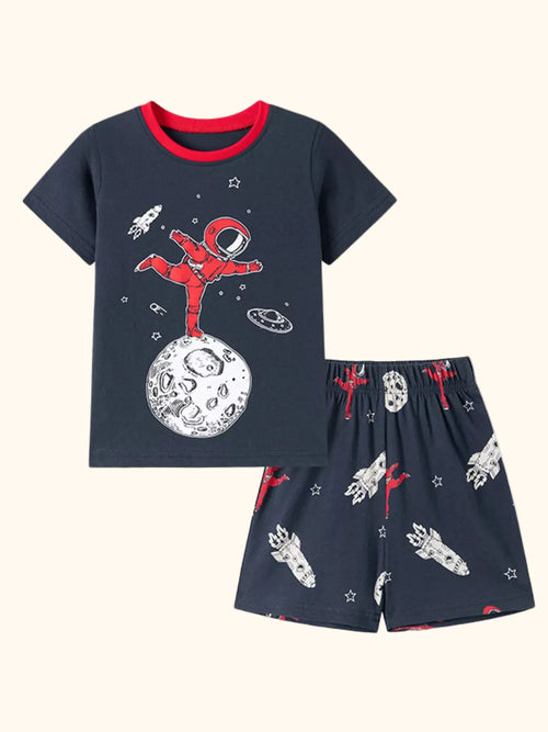 Dark gray kids astronaut graphic tee and rocket print shorts set, front product view