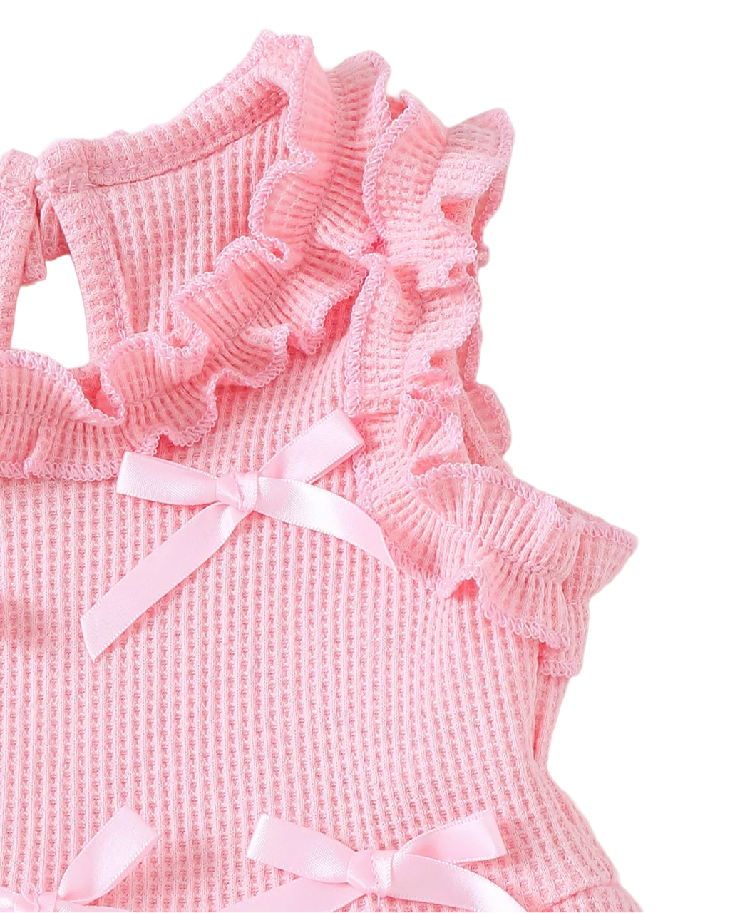 Pink baby bow waffle knit peplum top with layered ruffle shoulder trim, detail close-up