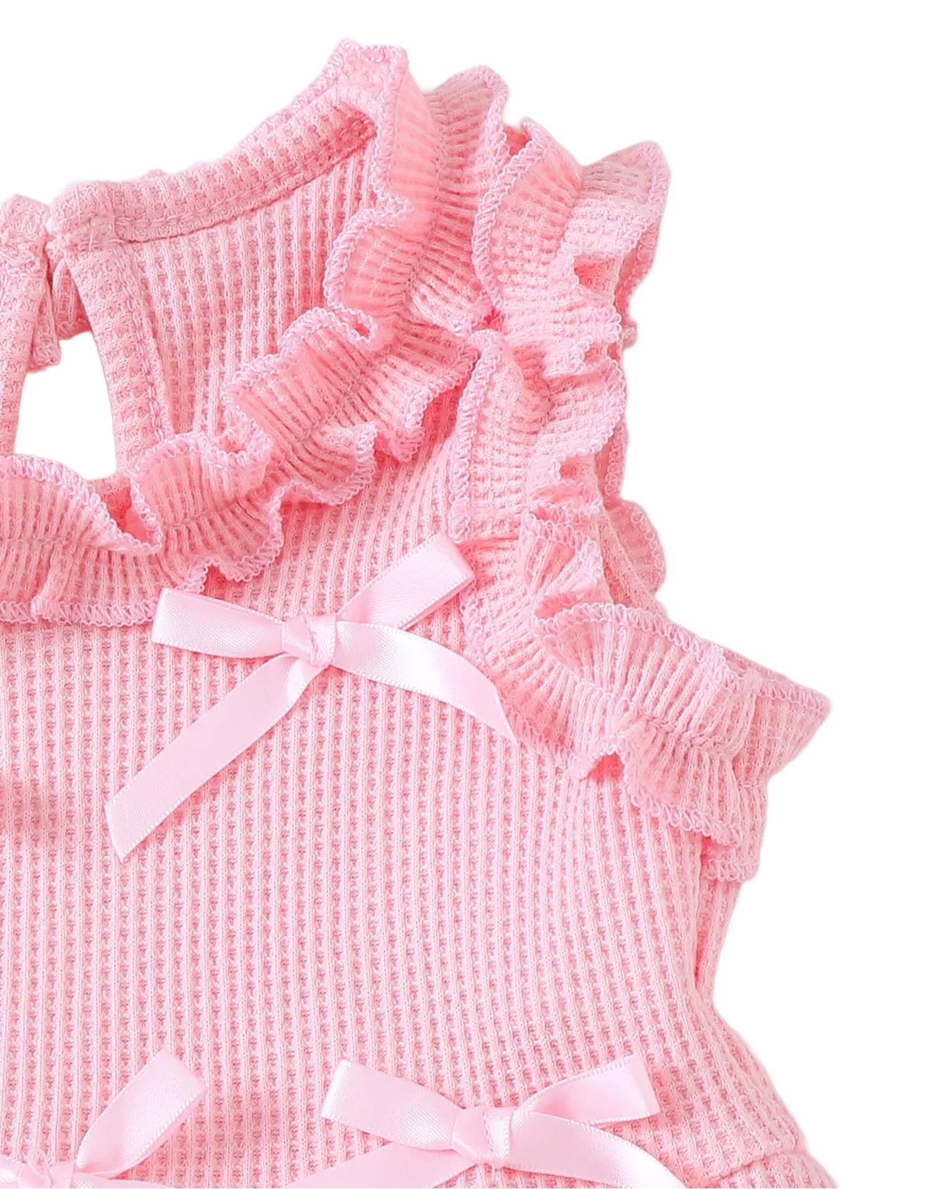 Pink baby bow waffle knit peplum top with layered ruffle shoulder trim, detail close-up