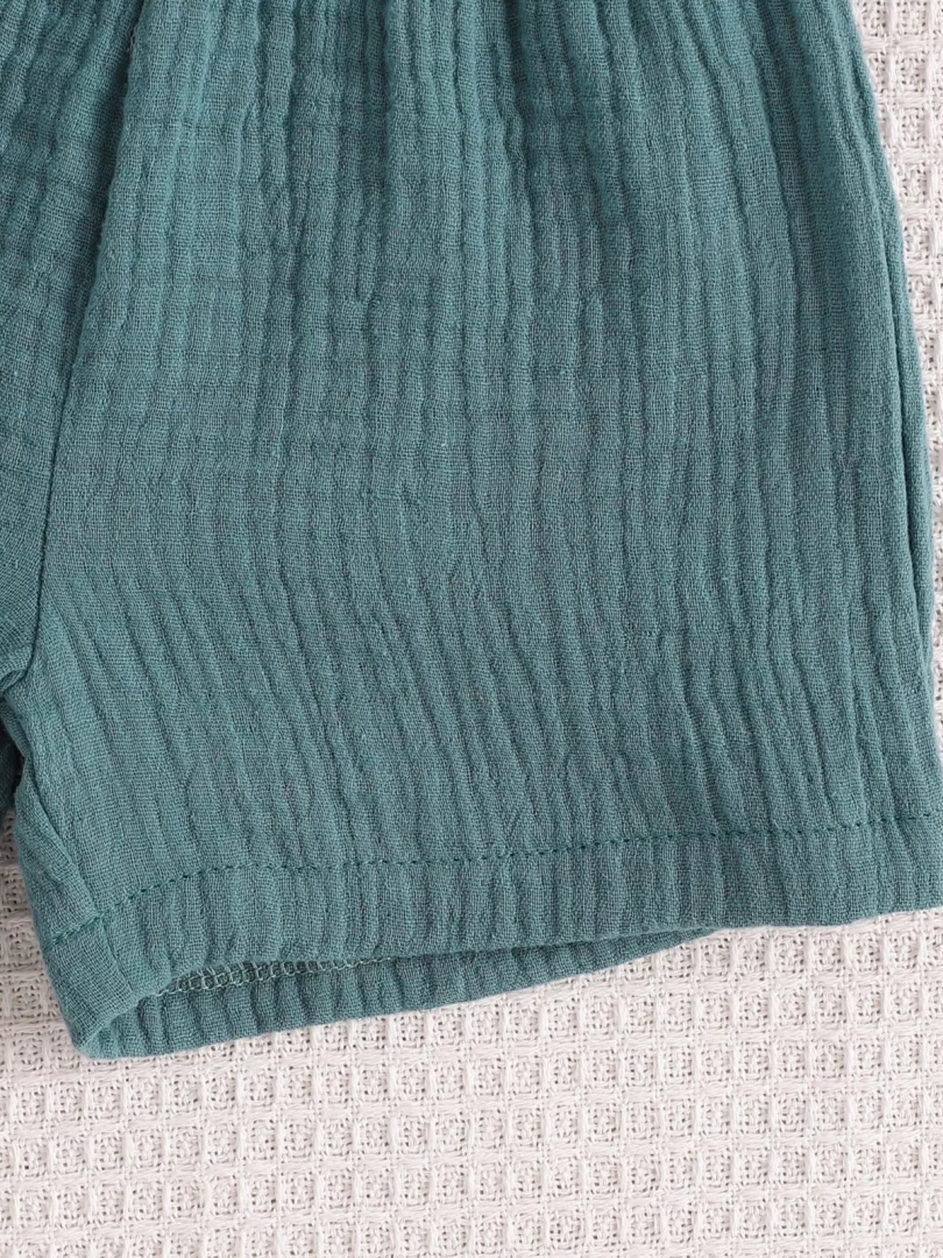 Sea blue baby textured shorts with finished leg hem,  