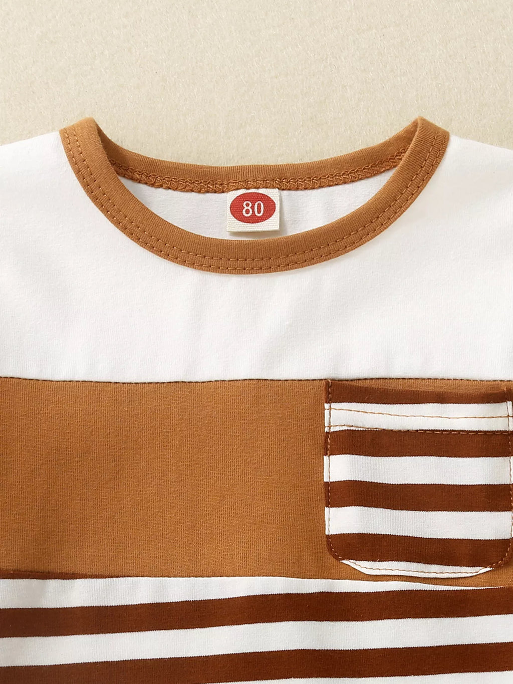 Chocolate baby striped T-shirt with contrast round neckline, neckline close-up