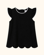 Black kids flutter-sleeve top with white contrast trim and scalloped hem, front product view