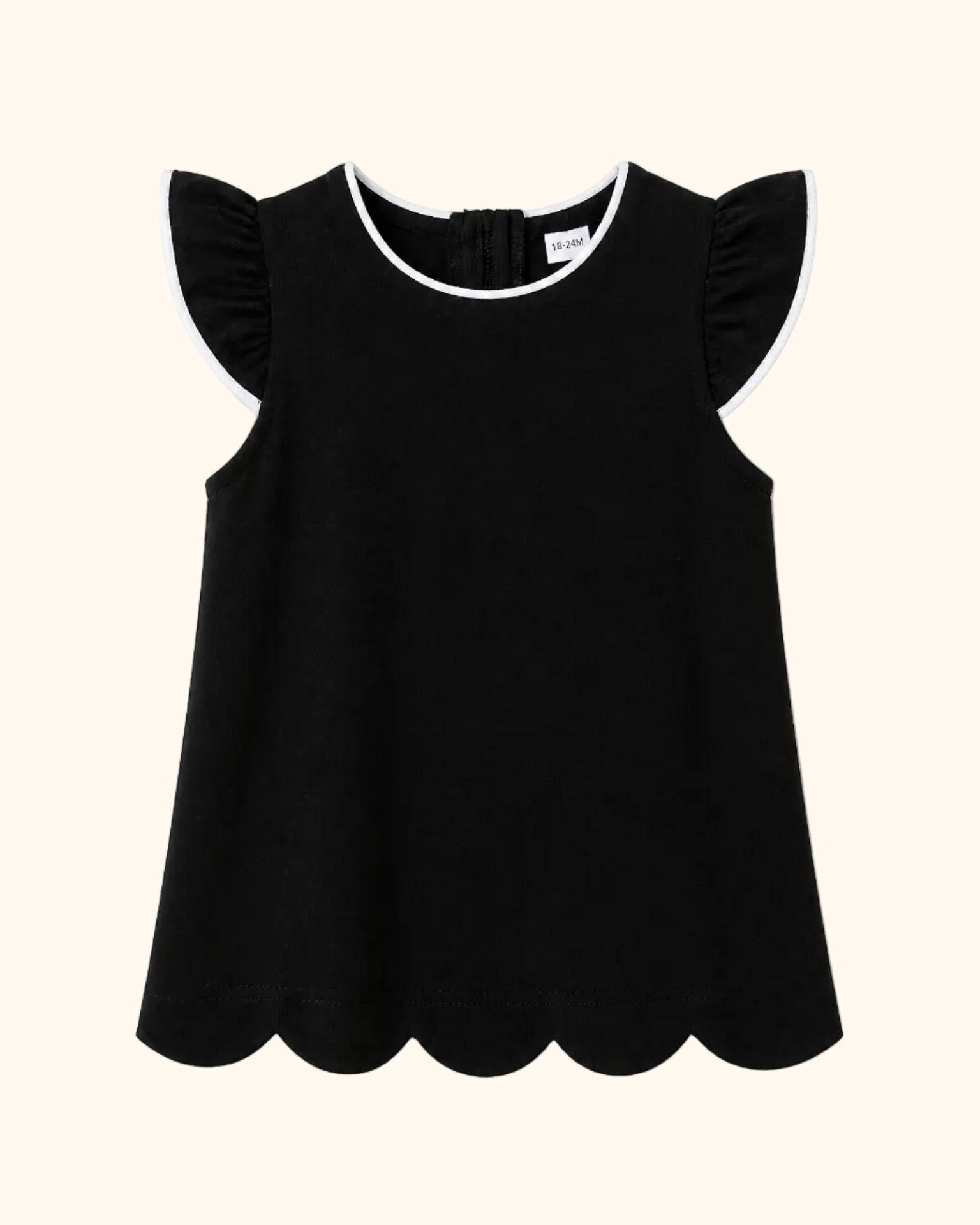 Black kids flutter-sleeve top with white contrast trim and scalloped hem, front product view