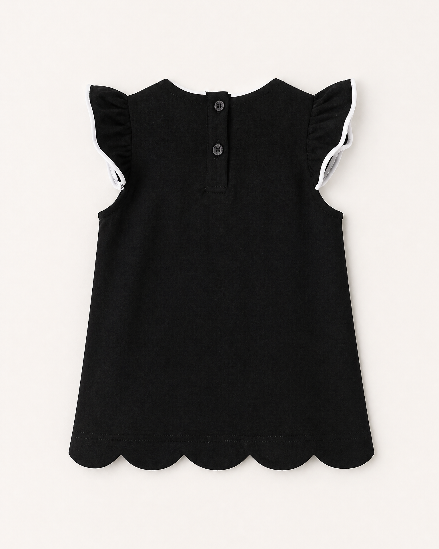 Black kids flutter-sleeve top with two-button back opening and scalloped hem, rear product view