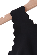 Black scalloped active top shoulder strap, close-up detail view
