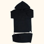 Blazing black hooded top with kangaroo pocket and matching kids jogger pants, flat lay front view