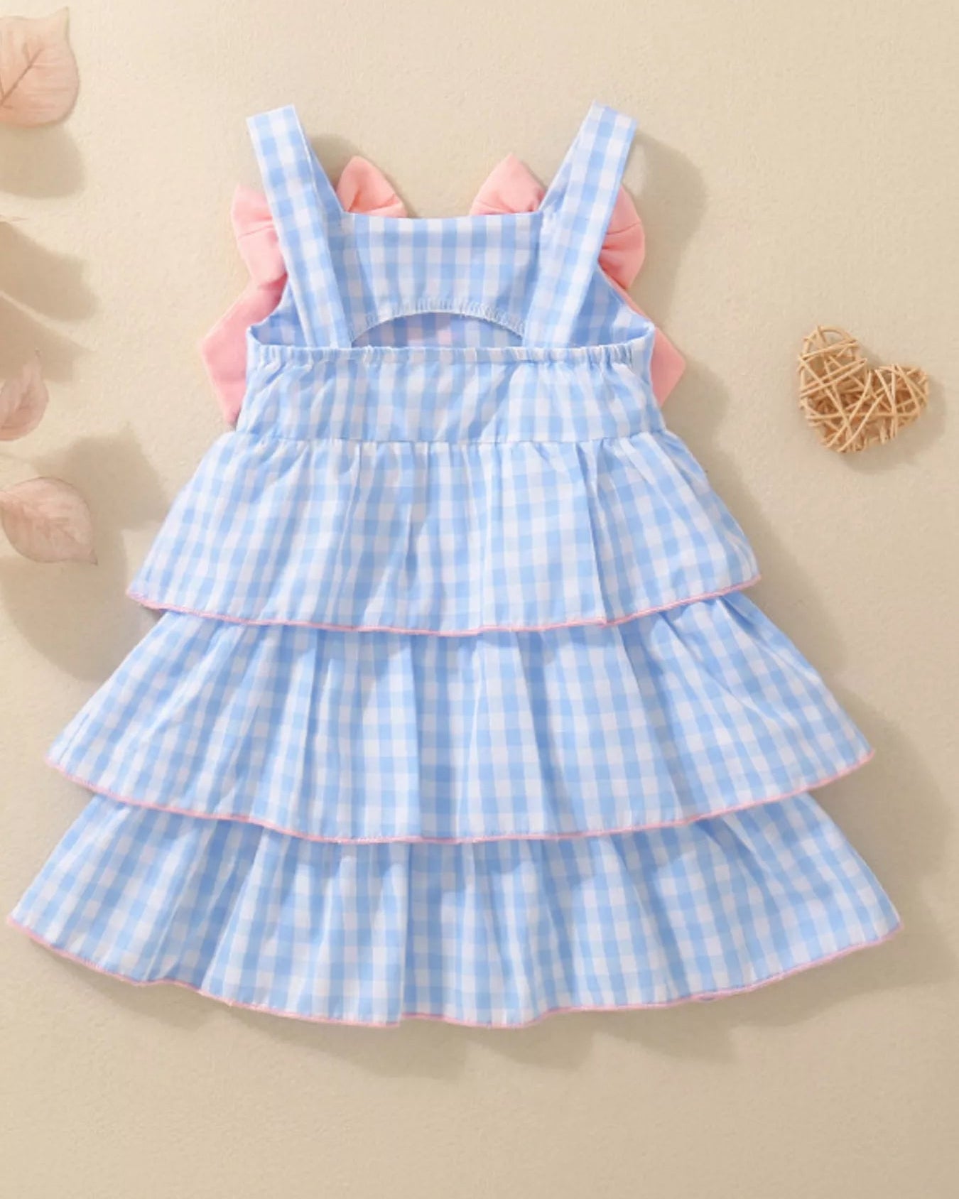 Blue gingham baby and toddler layered ruffle dress with elasticized open back, back product view