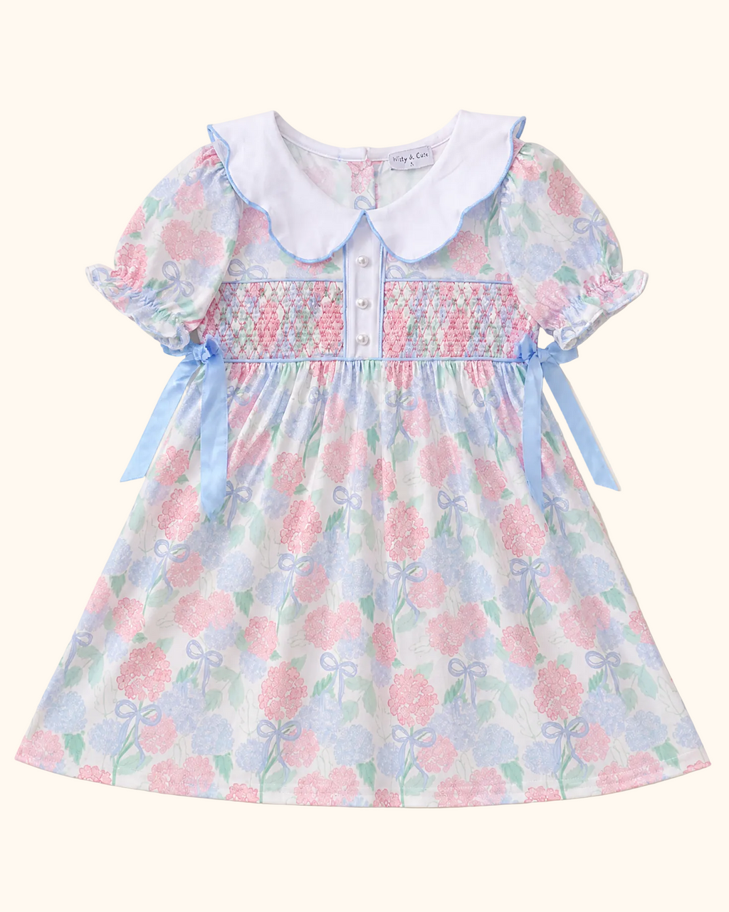 Blue and pink hydrangea kids smocked dress with pearl buttons and Peter Pan collar, front product view