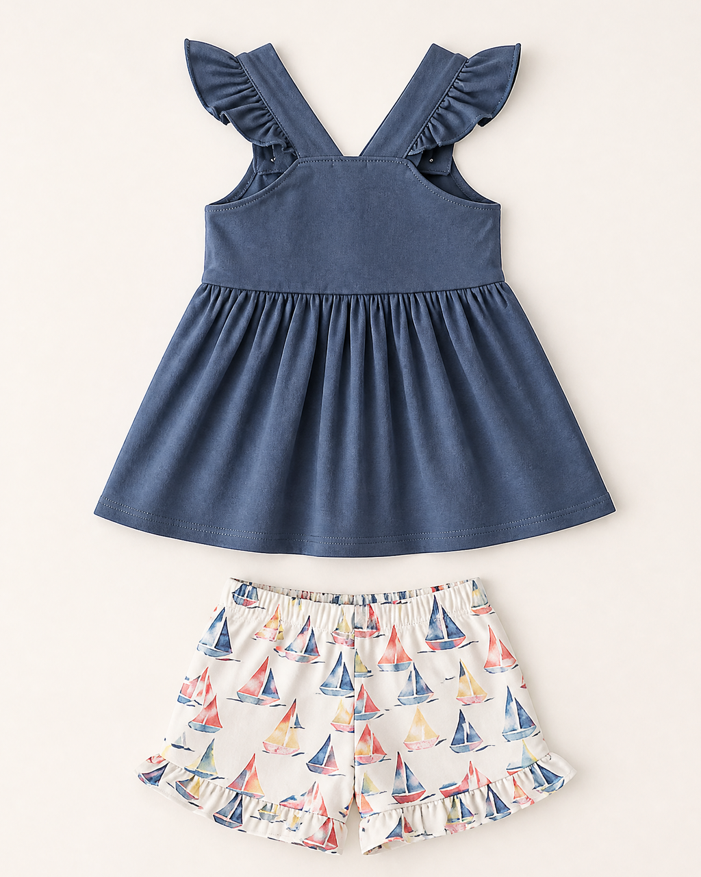 Blue sailboat smocked top and matching ruffle shorts set, back product view