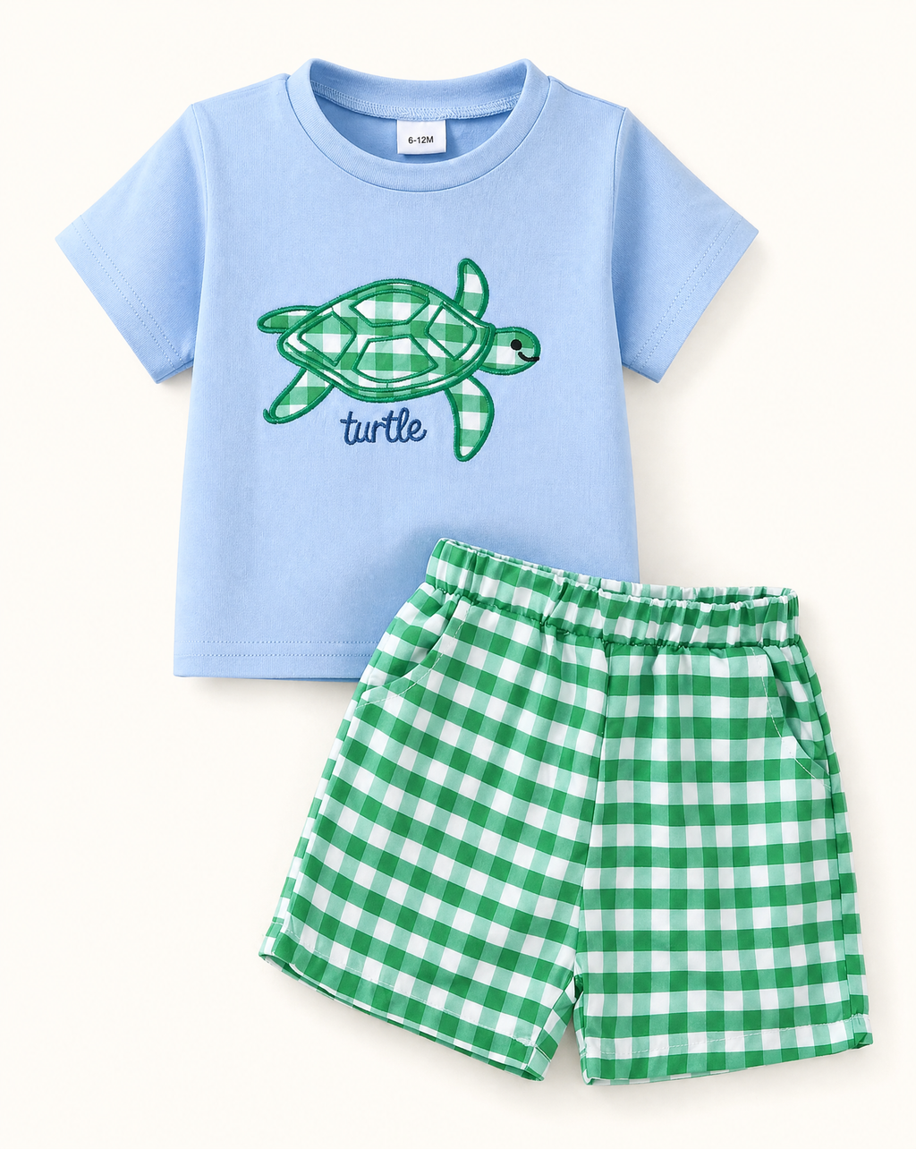 Blue baby turtle appliqué tee with green gingham pocket shorts, front product view