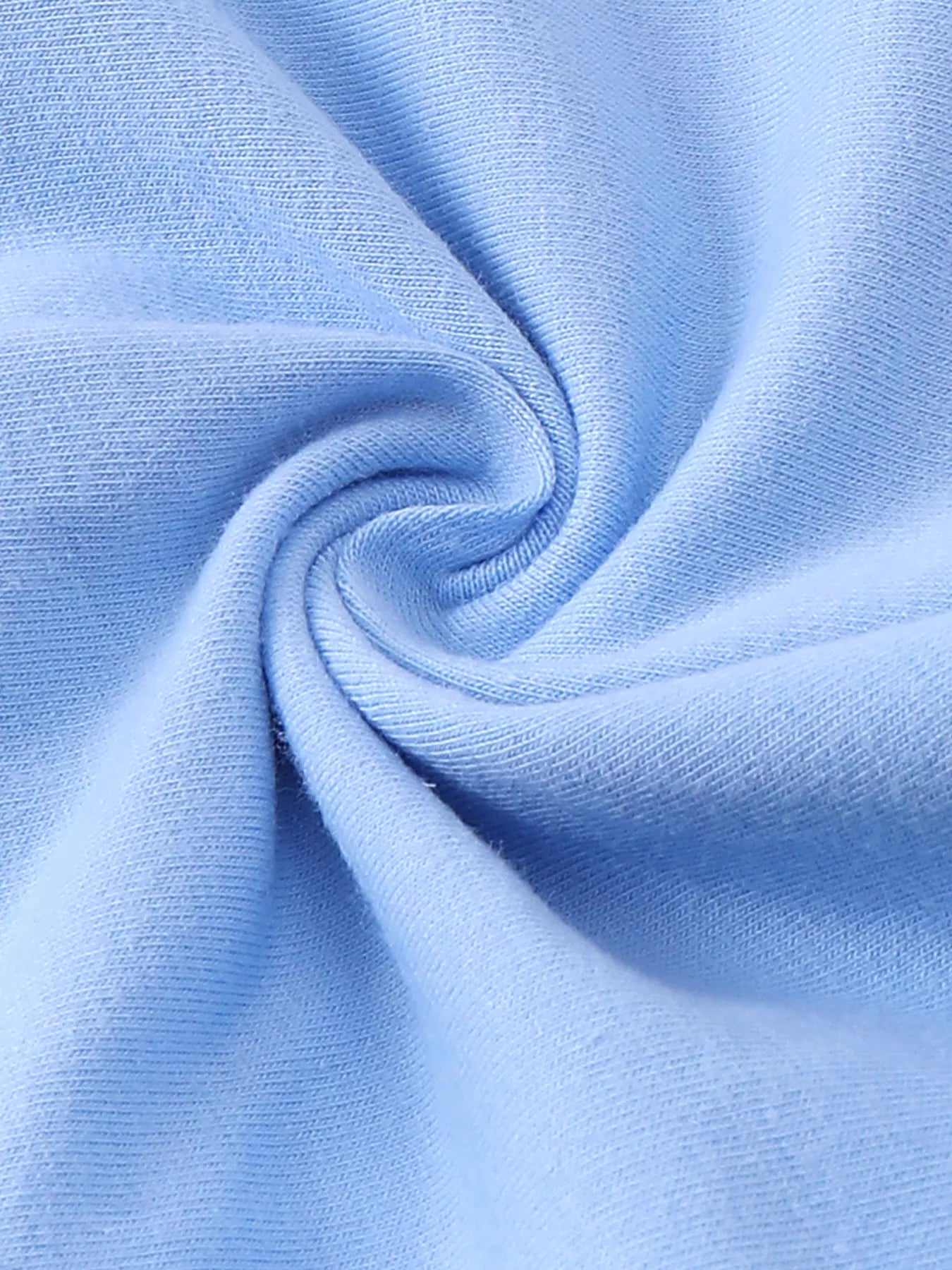 Blue baby tee fabric with soft knit texture, material close-up