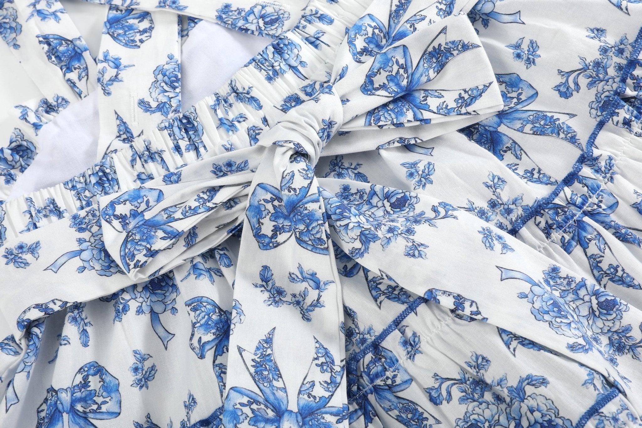 Blue and white kids sundress with self-tie back sash, waist detail