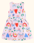 Blush pink kids butterfly and rainbow print sleeveless dress with hearts and flowers, back view