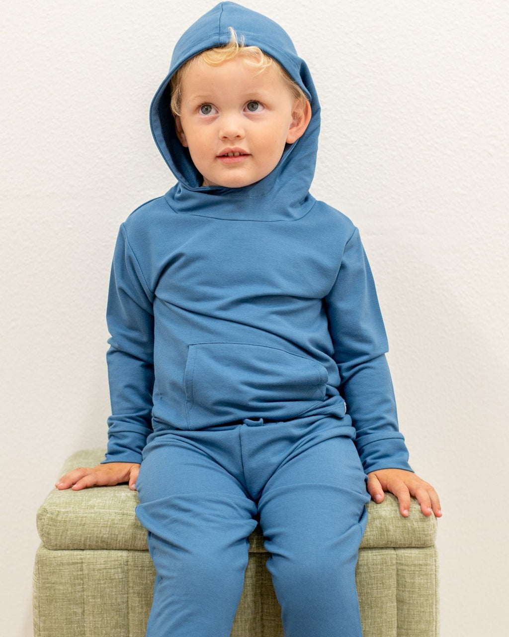 Captain blue kids hooded jogger set with kangaroo pocket, front lifestyle view