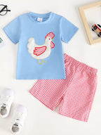 Light blue baby and toddler chicken appliqué T-shirt with red gingham shorts, front product view