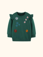 Dark green kids floral embroidered crew neck sweatshirt with ruffle shoulders, front view