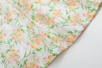 Ivory kids dress with peach pink and green botanical floral print,  