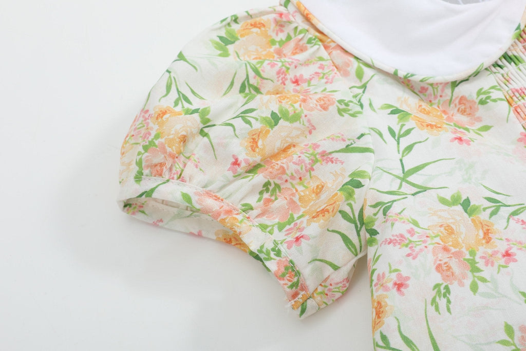 Ivory floral kids dress with gathered short puff sleeve, sleeve close-up