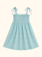 Green floral kids smocked shoulder-tie dress with gathered skirt, front product view