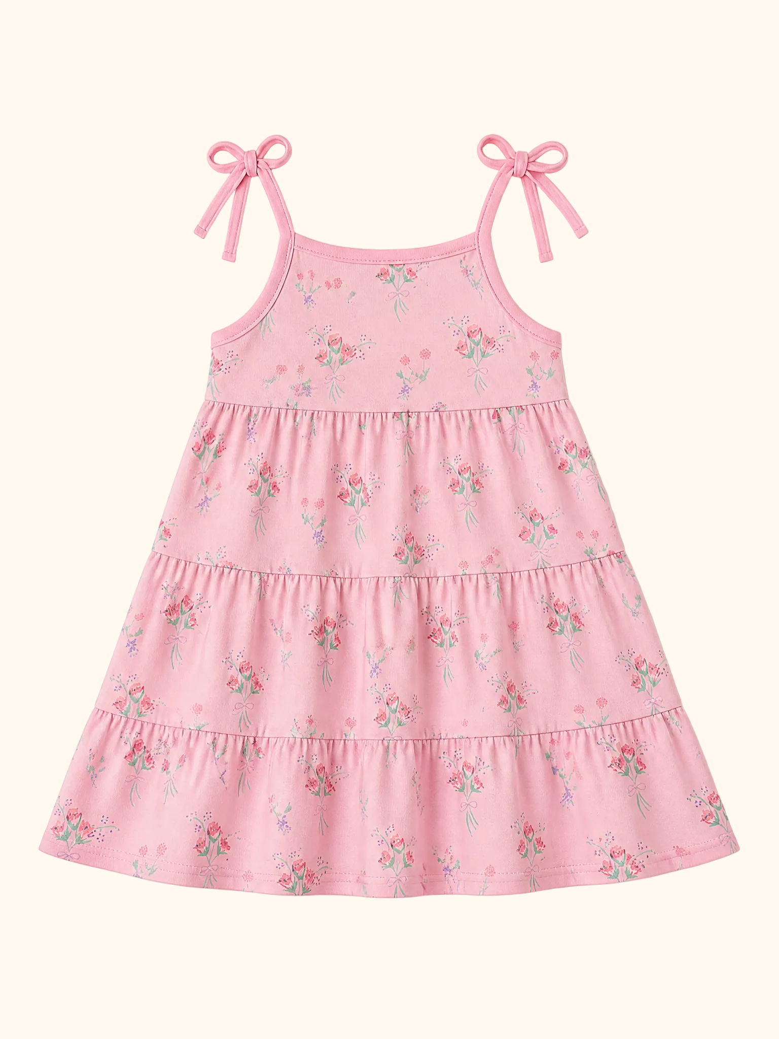 Pink floral kids tiered dress with bow-tie shoulder straps, front product view