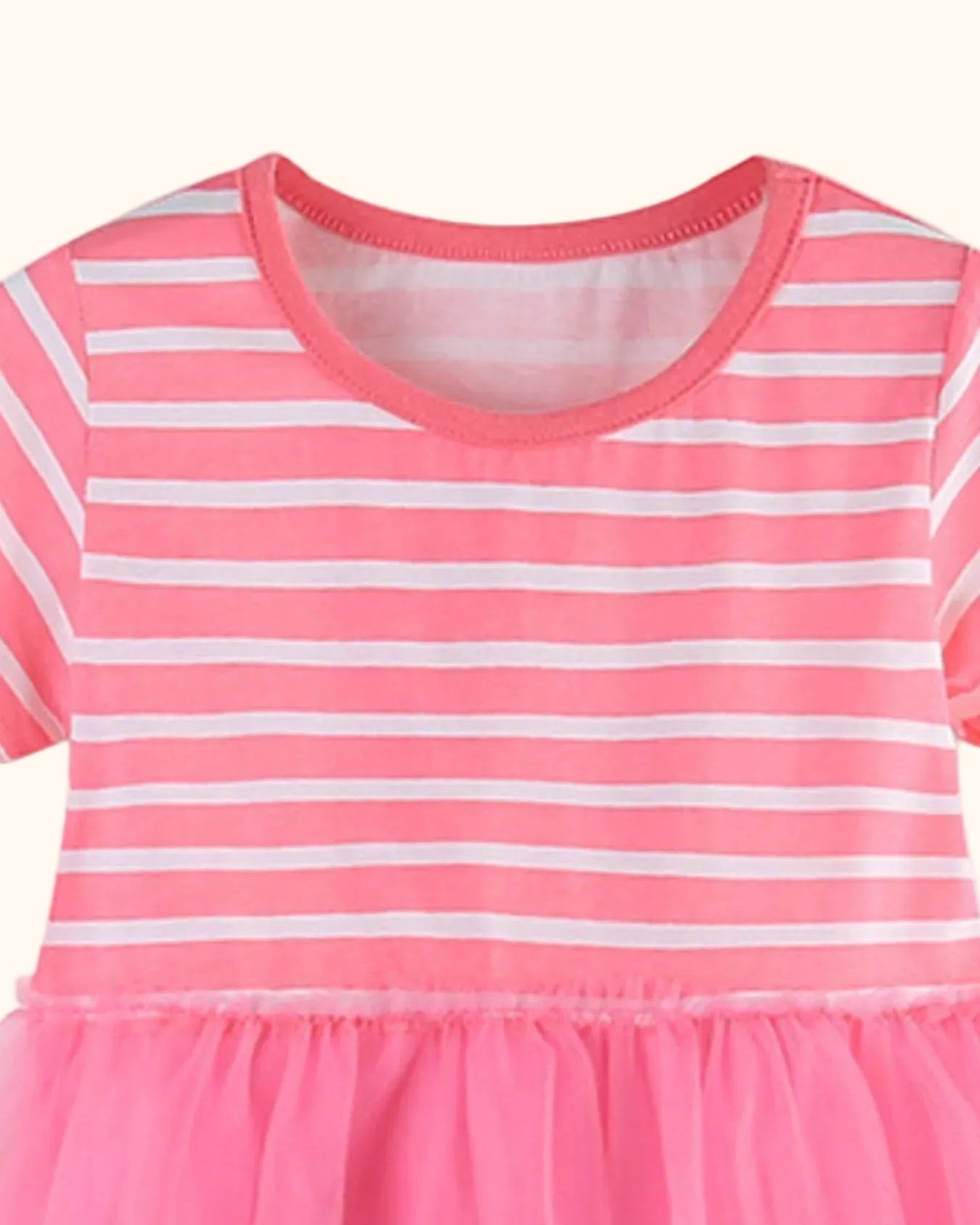 Fuchsia pink and white striped kids tulle dress with round neckline, bodice close-up