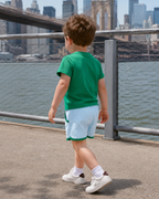 Green pocket T-shirt and blue gingham kids shorts, back lifestyle view