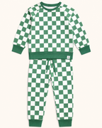 Green and white checker crew neck top and matching kids jogger pants, flat lay front view
