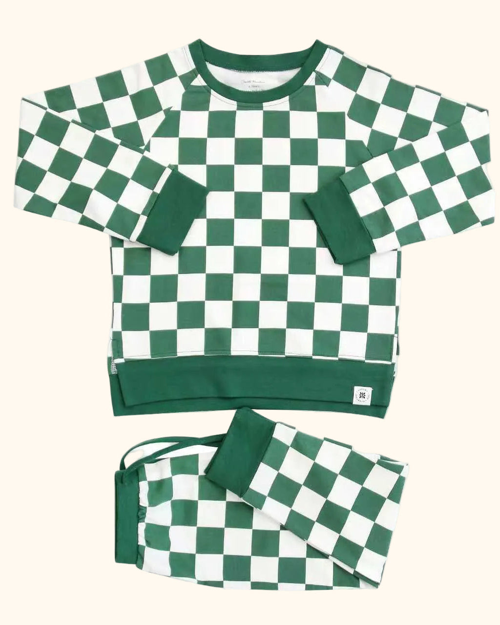 Green checker kids crew neck top and matching jogger pants with solid green trim, product view