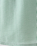 Green and white striped seersucker dress fabric, close-up texture view