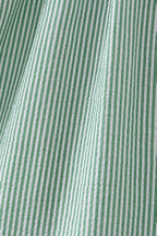 Green and white vertical stripe seersucker fabric, close-up view