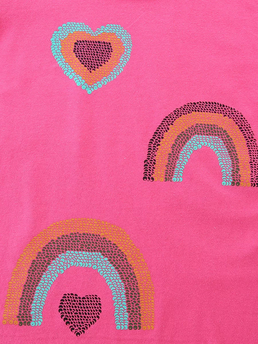 Hot pink kids T-shirt with colorful heart and rainbow graphics, front design close-up