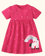 Hot pink kids unicorn appliqué dress with rainbow detail and tiny floral print, front product view