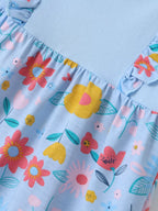 Lake blue floral ruffle dress with coral, yellow and pink flower print, close-up skirt view