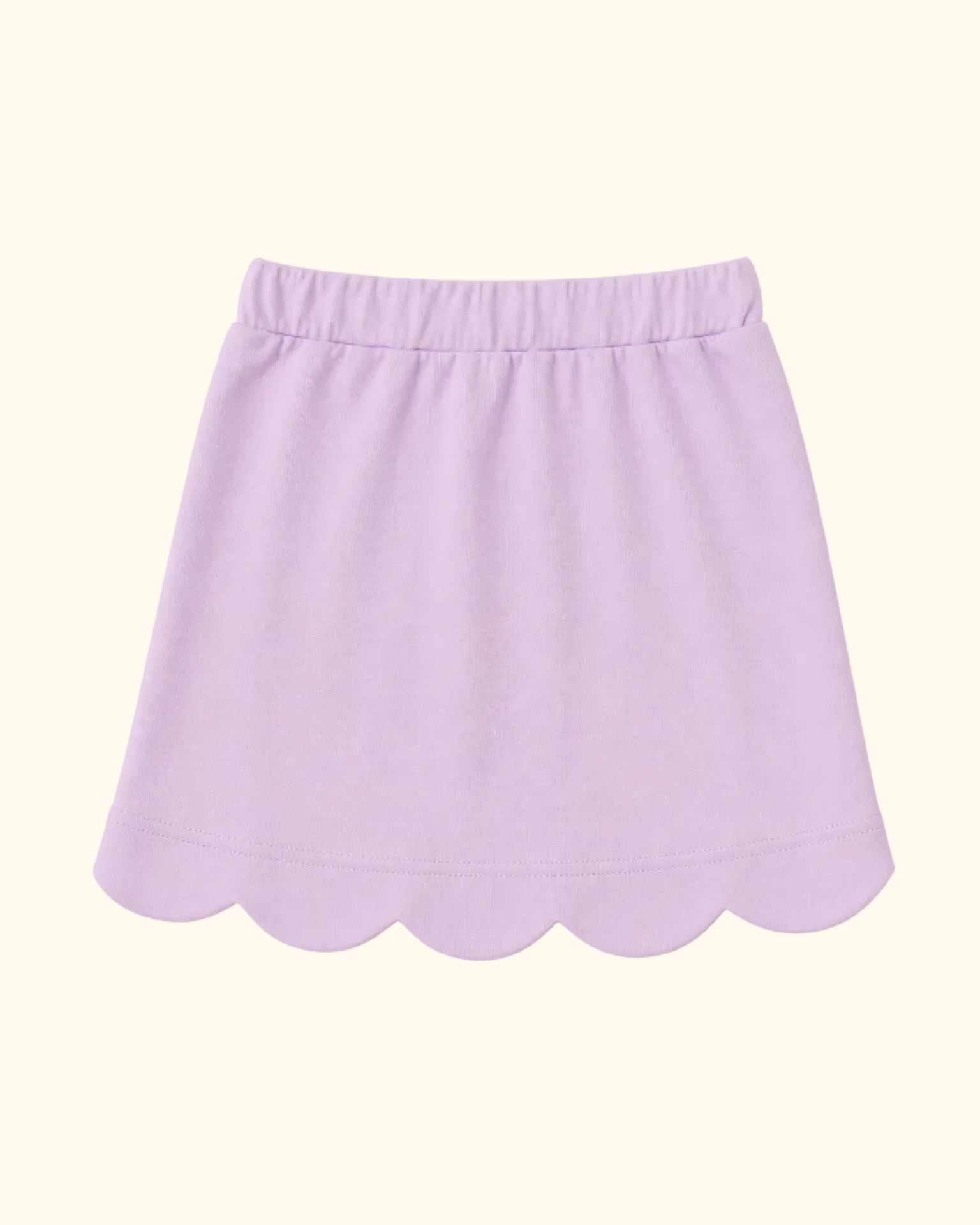 Lavender kids skort with scalloped hem and elastic waistband, back view