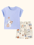 Light blue kids cat appliqué T-shirt and cream printed shorts set, front product view