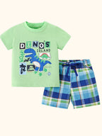 Light green kids Dino Island graphic T-shirt and blue plaid shorts set, front product view