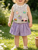 Light purple baby appliqué top and matching shorts set, modeled front view