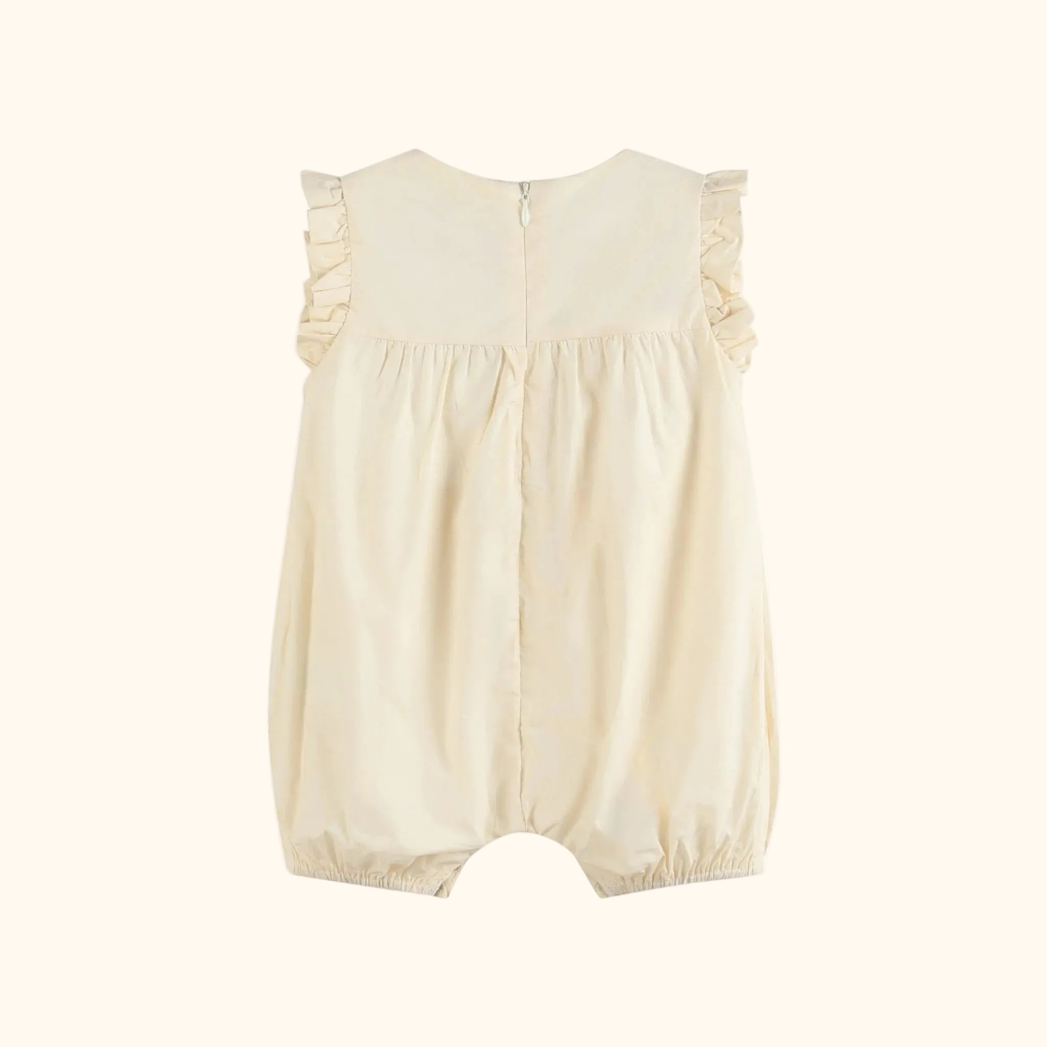 Light yellow baby ruffle romper with gathered bubble silhouette and back zipper, back product view