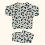 Ivory truck print crew neck pocket top and matching kids jogger pants, flat lay front view