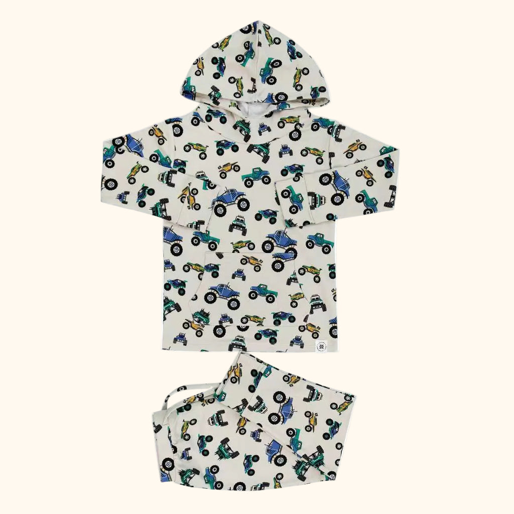 Ivory monster truck hooded top and matching kids jogger pants, flat lay front view
