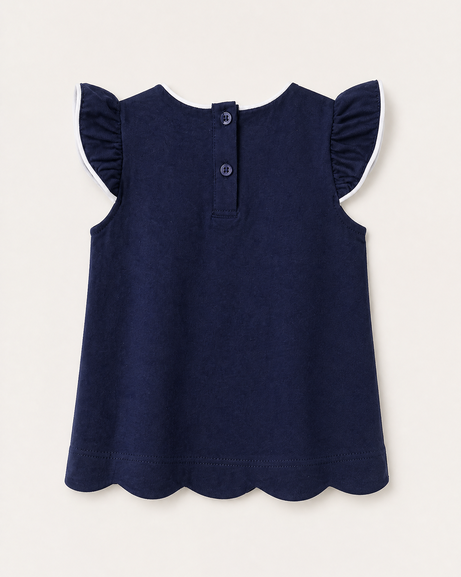 Navy kids flutter sleeve scalloped top with two-button back closure, back view